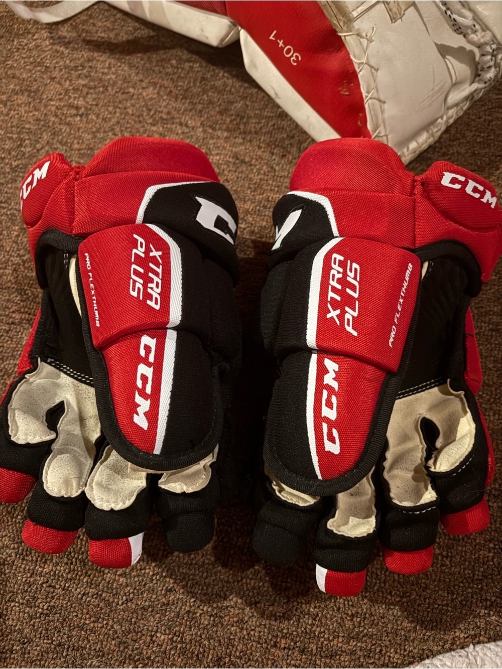 CCM Xtra Plus Red and Black Hockey Gloves